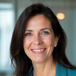 Professional headshot of Dr. Maria Rodriguez, a warm and empathetic functional medicine practitioner.